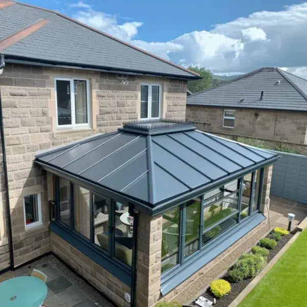Solid insulated replacement conservatory roof with grey panels from the Ultimate Home Solutions gallery