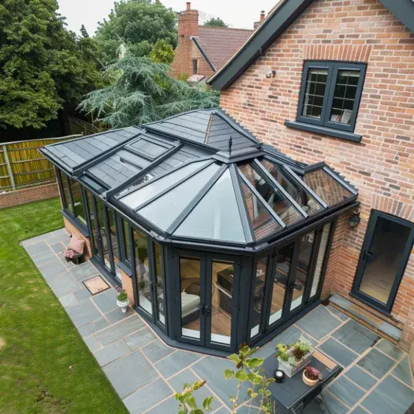 Hybrid tiled and glass conservatory roof on a brick house from the Ultimate Home Solutions gallery