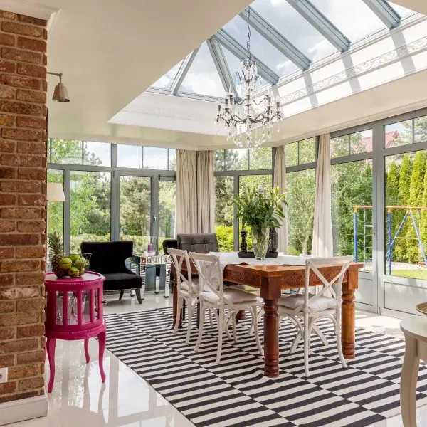 Dining space beneath a glazed roof lantern